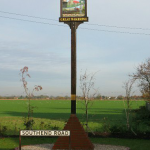 The new Village Sign Post